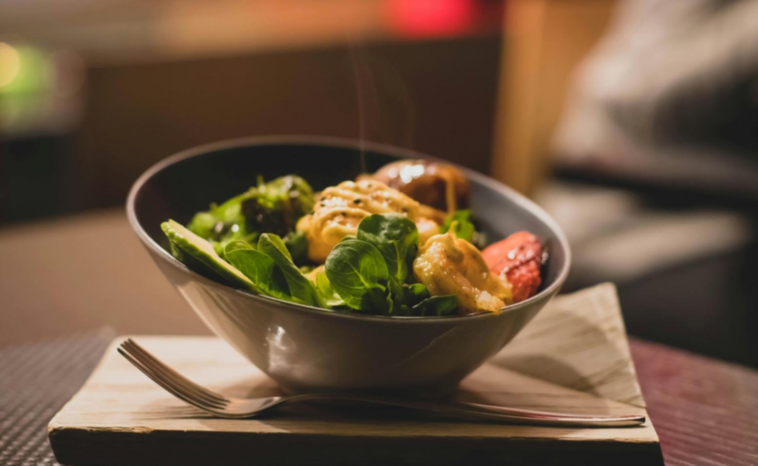 Professional kitchen workspace showcasing gourmet cooking techniques and culinary education environment